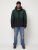 Горнолыжная куртка мужская темно-зеленого цвета 88819TZ фото в интернет-магазине FrontFlip.Ru